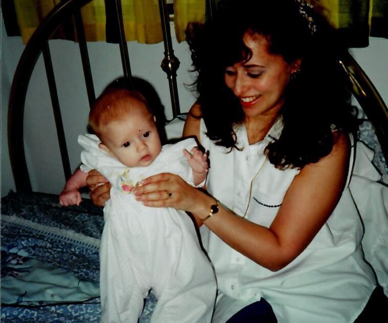 A mother with her baby in the early 1990s. 
